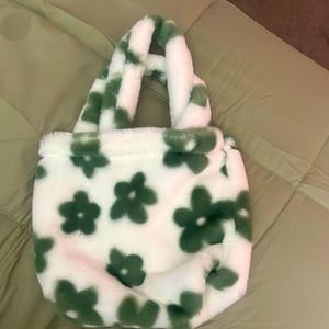 A White and Green fluffy bag